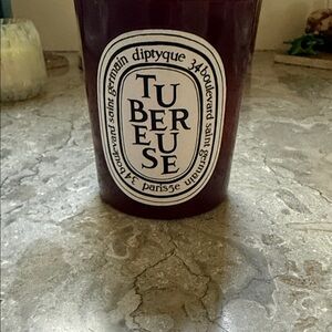 diptyque TUBEREUSE Candle in Deep Burgundy Glass
